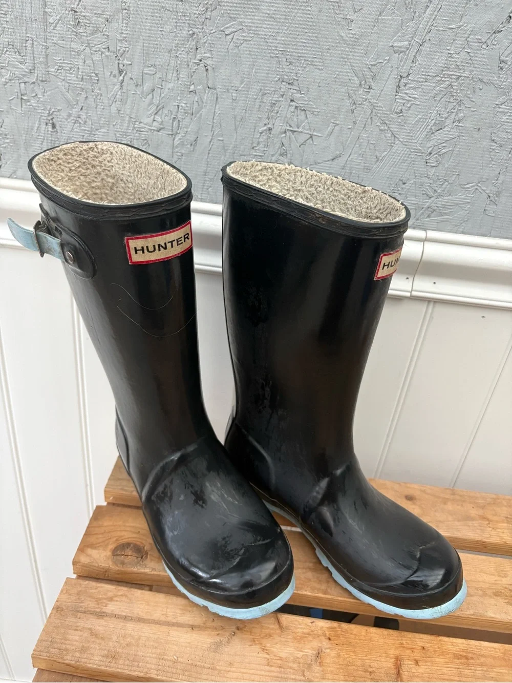 Hunter Kids Black Rain Boots with Light Blue Soles and Cozy Lining